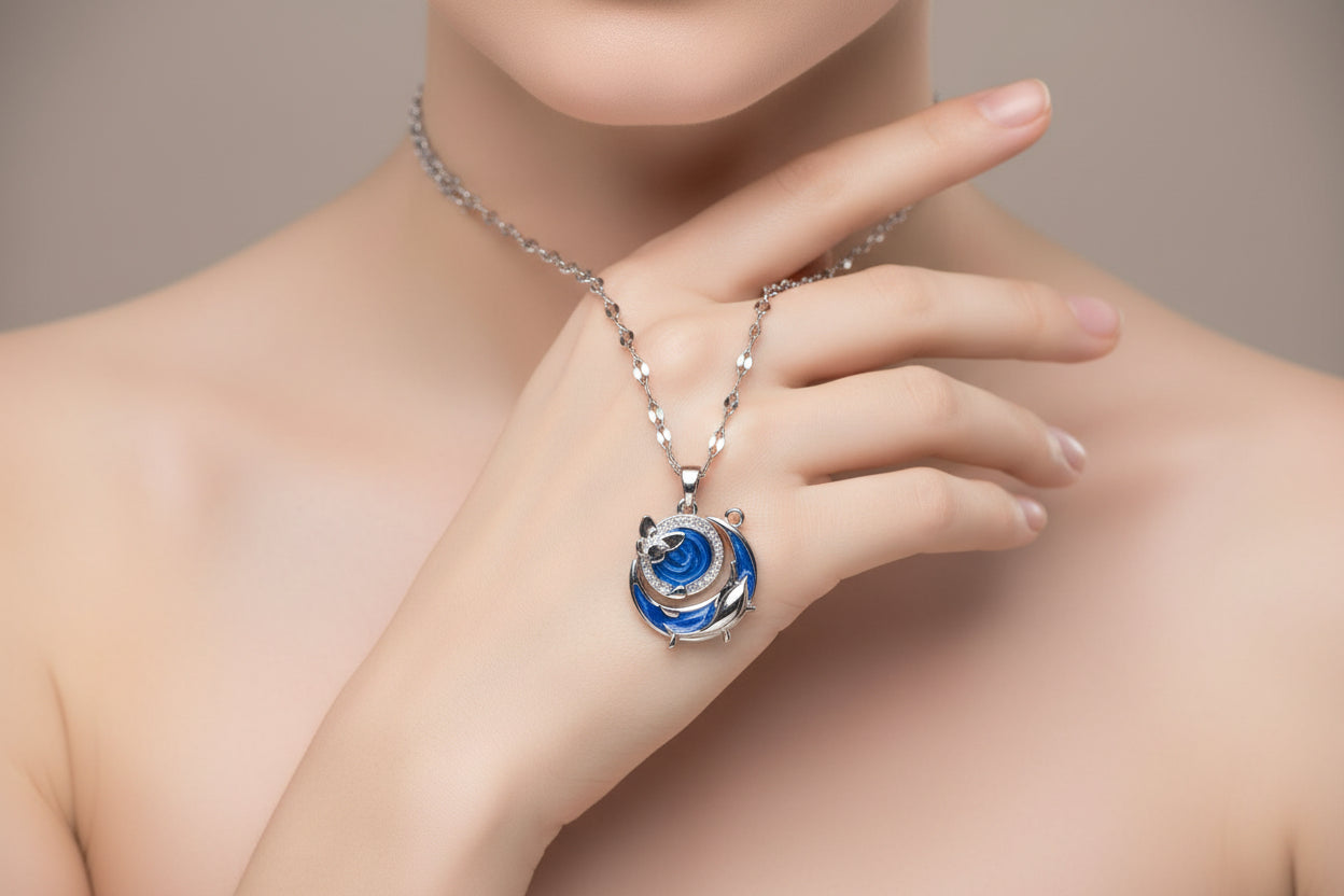 Yoniq.woman silver-tone crescent moon and dolphin pendant necklace with blue enamel inlay and sparkling crystal accents
