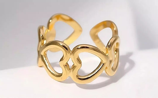 Yoniq.woman gold-tone adjustable ring featuring a delicate openwork heart link design with a polished finish.